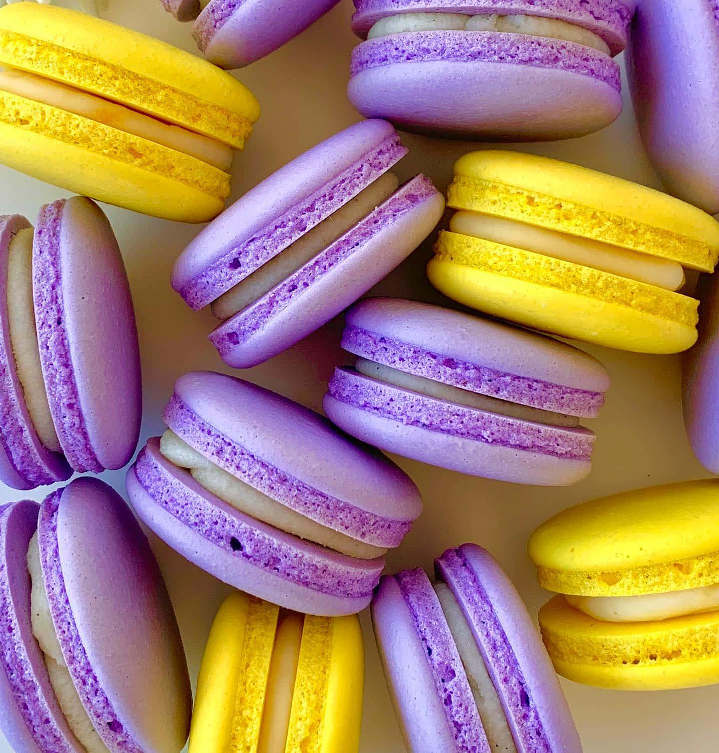 Yummy Yellow And Violet Macaroons Wallpaper