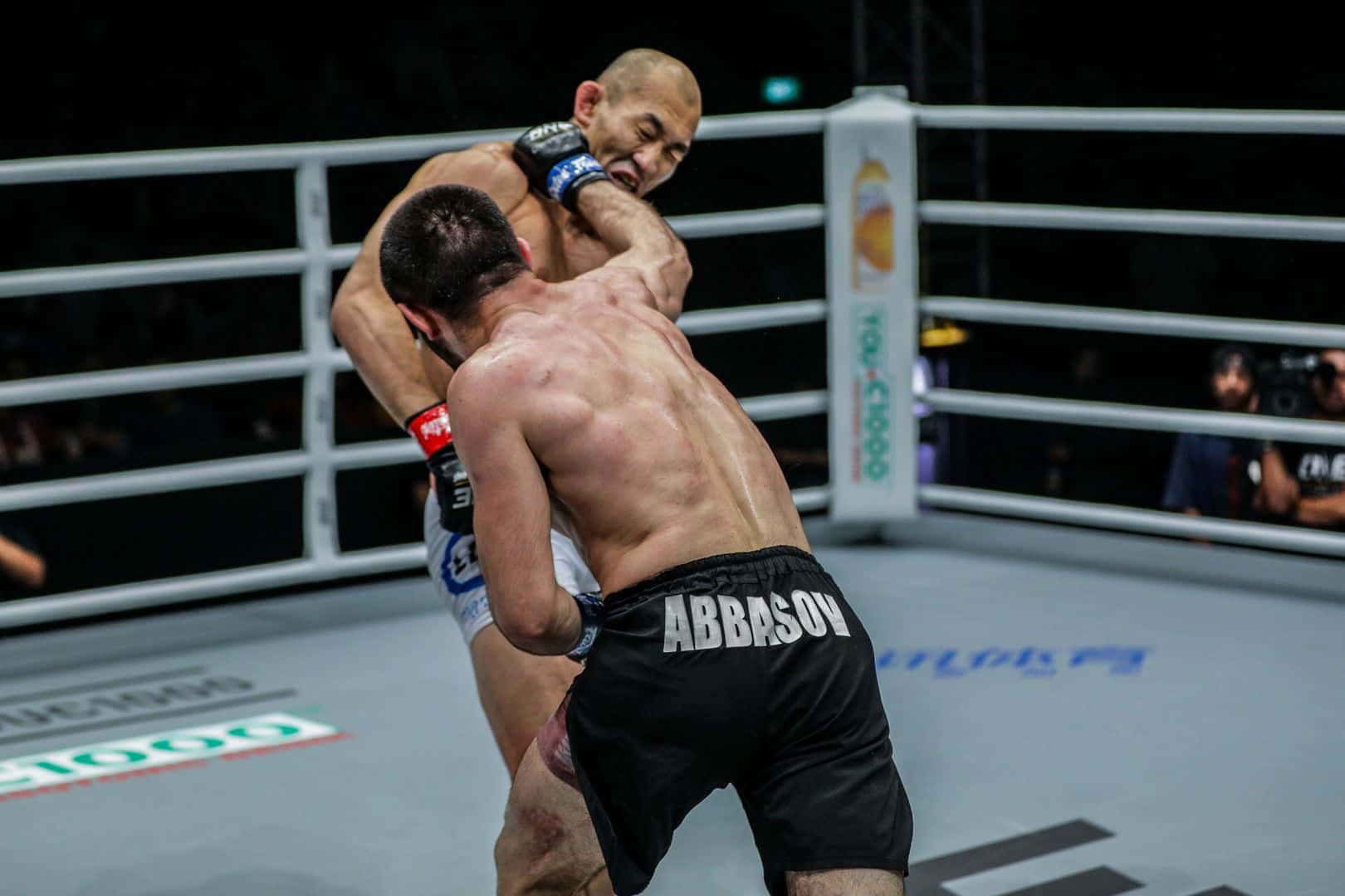 Yushin Okami versus Kiamrian Abbasov in ONE Championship event. Wallpaper