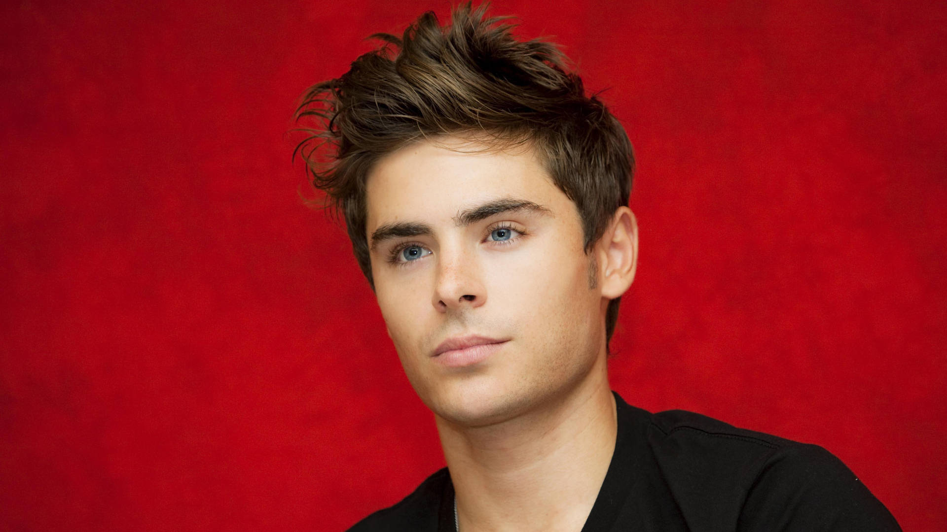 Zac Efron In Red Backdrop