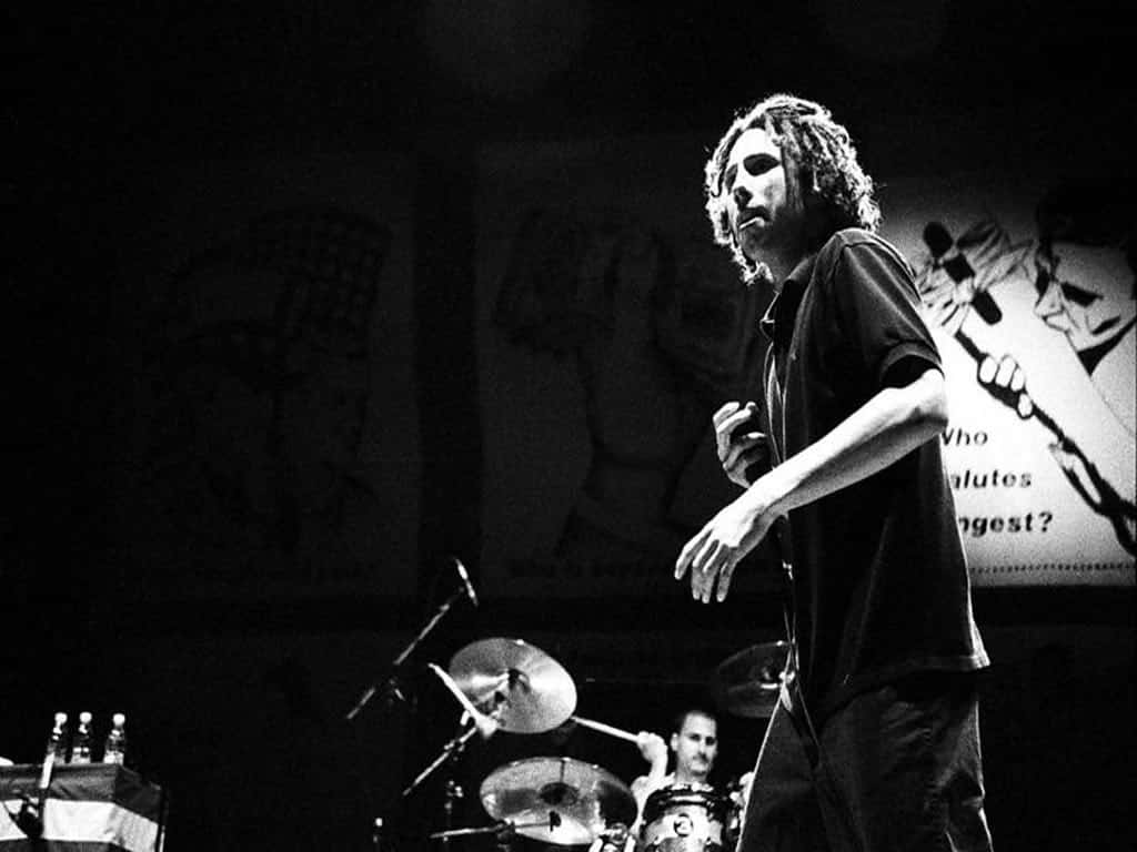 Zack De La Rocha On Stage Blackand White Wallpaper