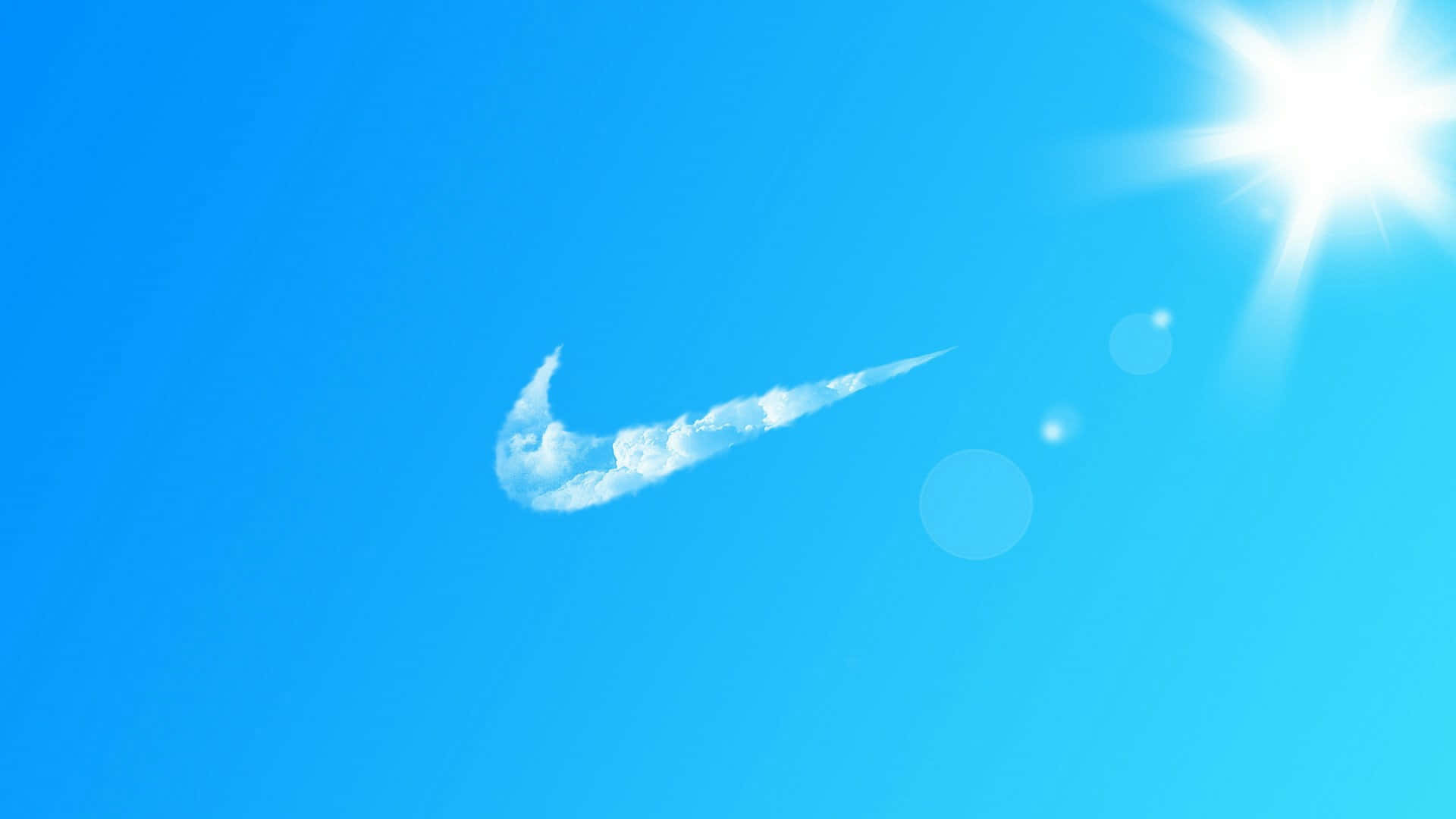 Zapatillasde Correr Nike Azules En Una Pista Fondo de pantalla