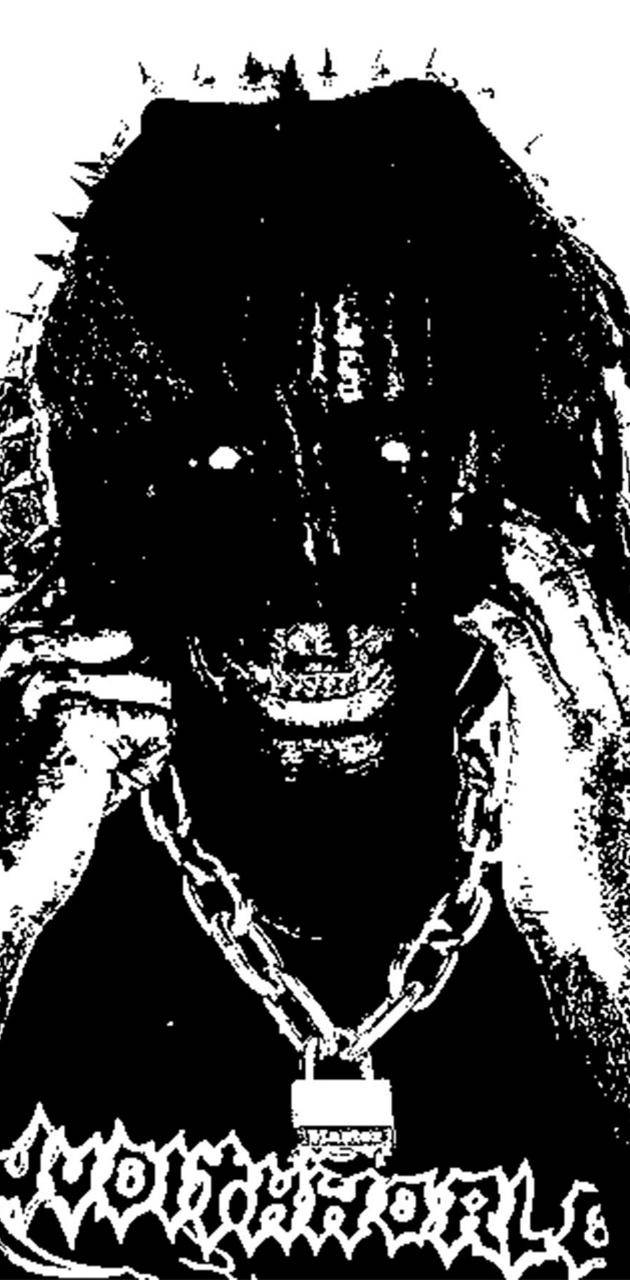 Einschwarz-weiß Bild Eines Mannes Mit Ketten Im Gesicht. Wallpaper