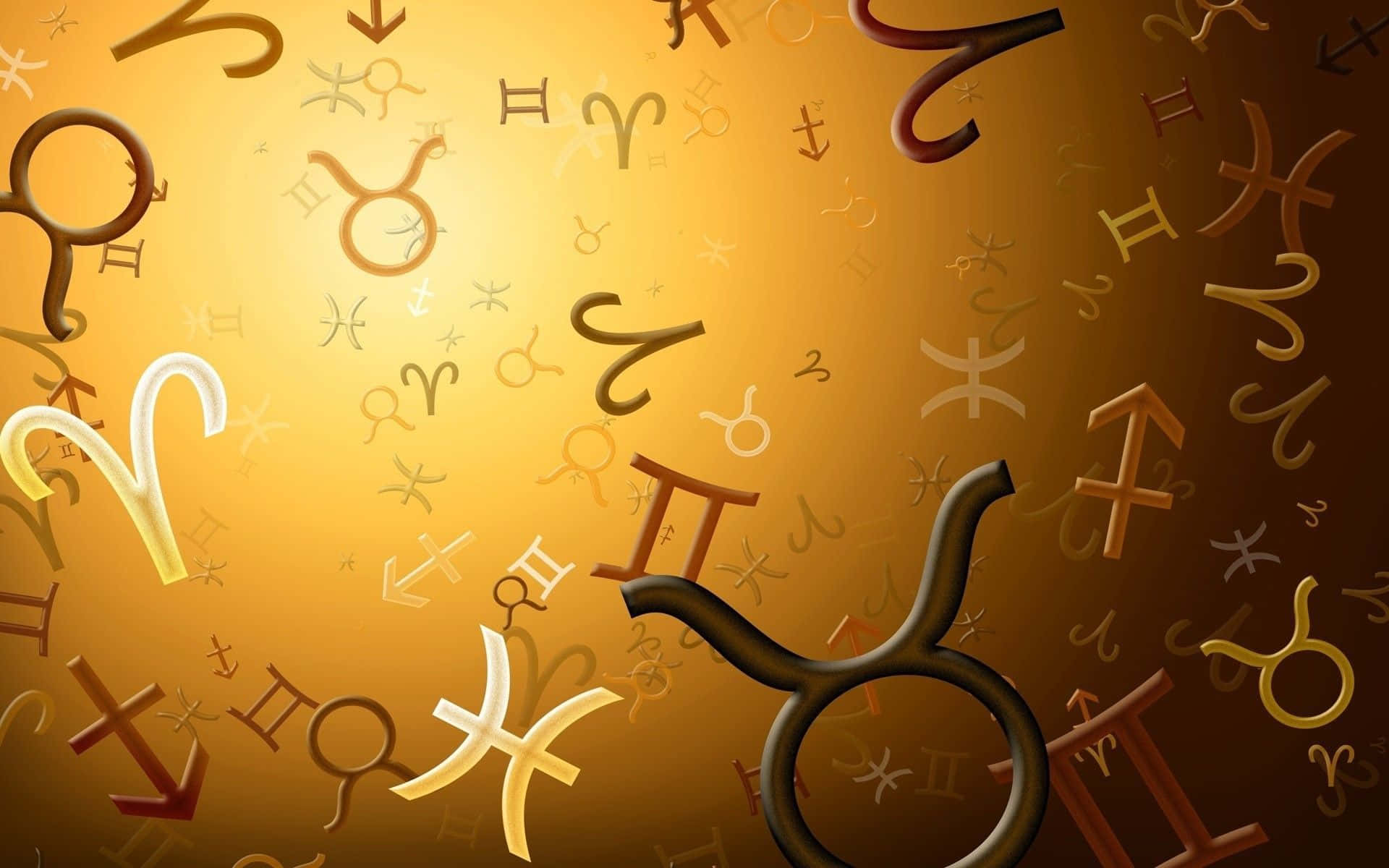 a group of zodiac signs on a brown background