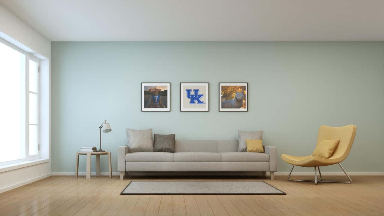 A Living Room With A Couch, Chair And Framed Pictures