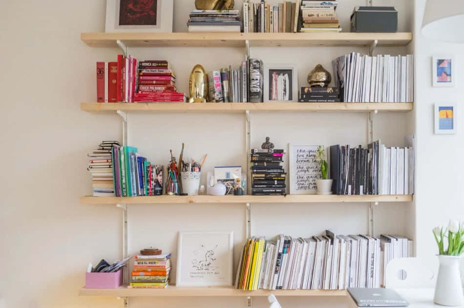 A Room With A Desk, Bookshelves And A Desk