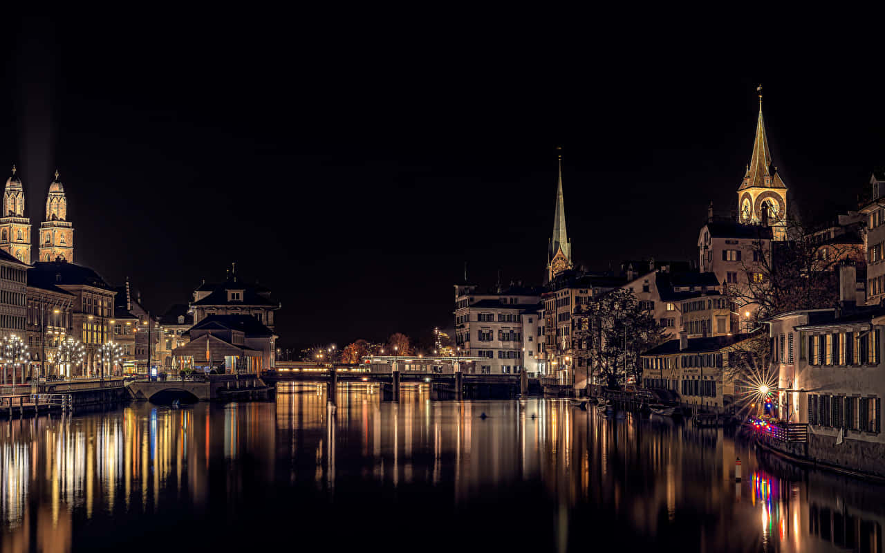 Zurich Nighttime River Reflections Wallpaper