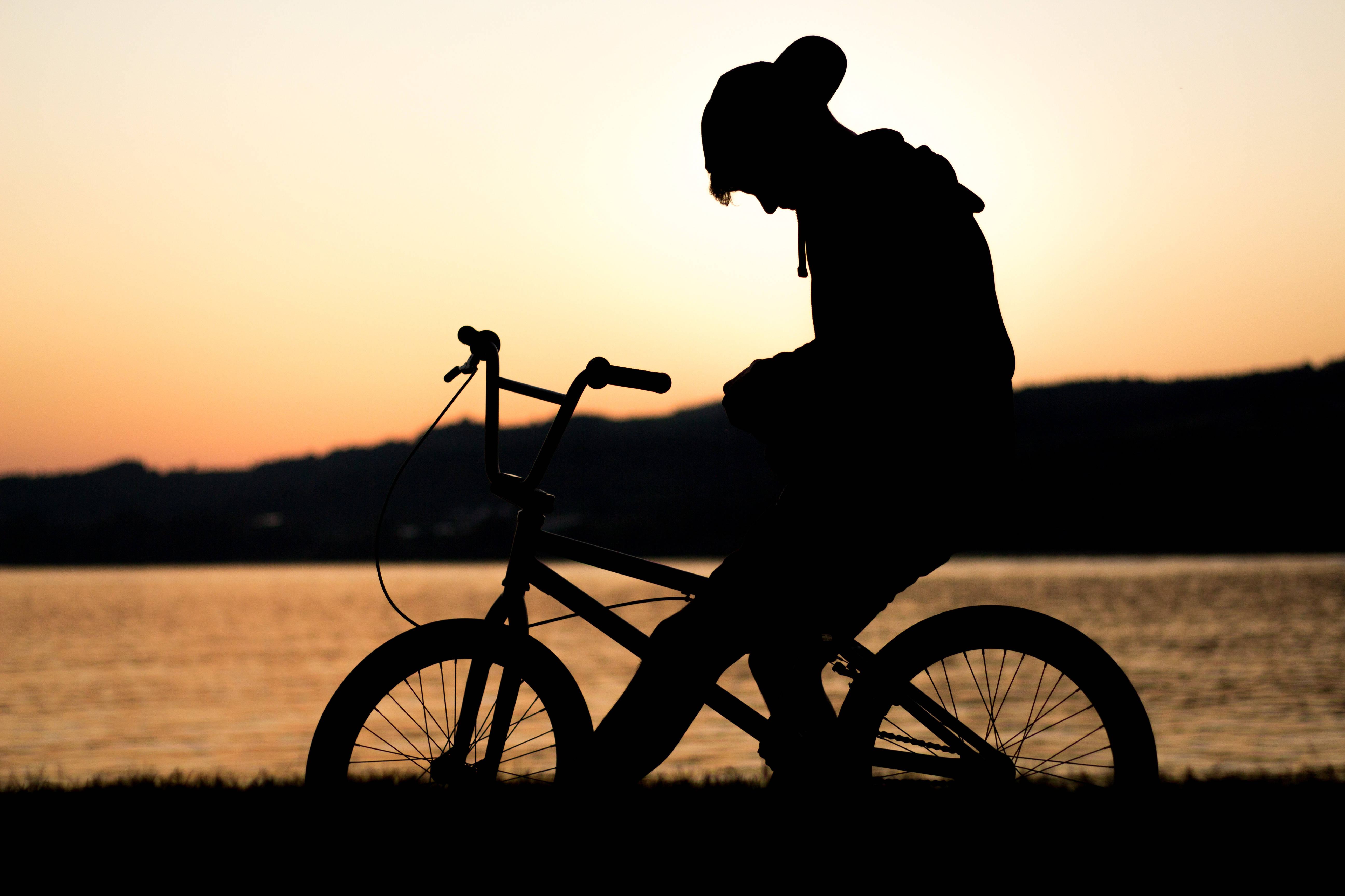 Download Biker Boy Silhouette Wallpaper 