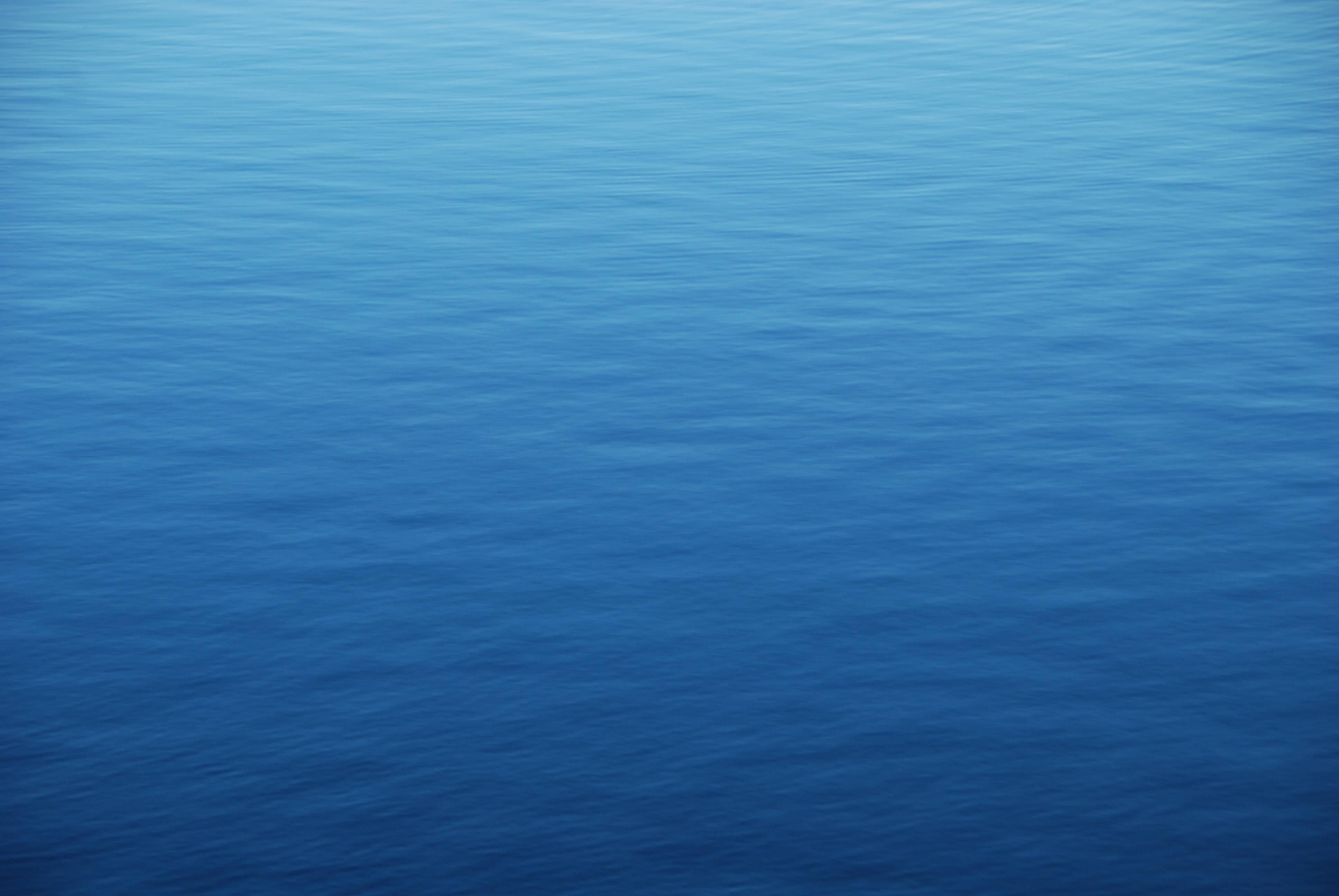 Download View from Above of the Calm Blue Ocean Water Wallpaper ...