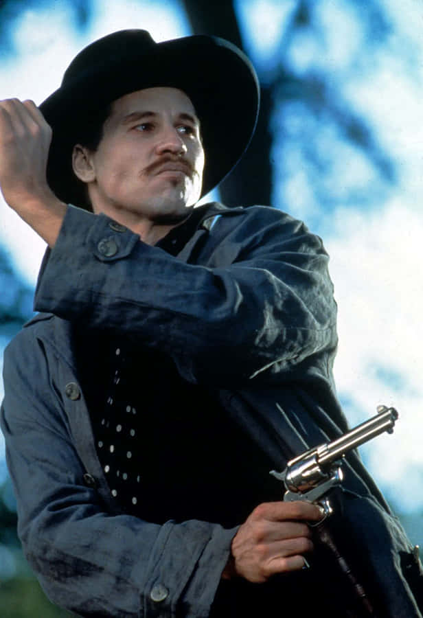 Cowboy I Svart Hatt Med Revolver