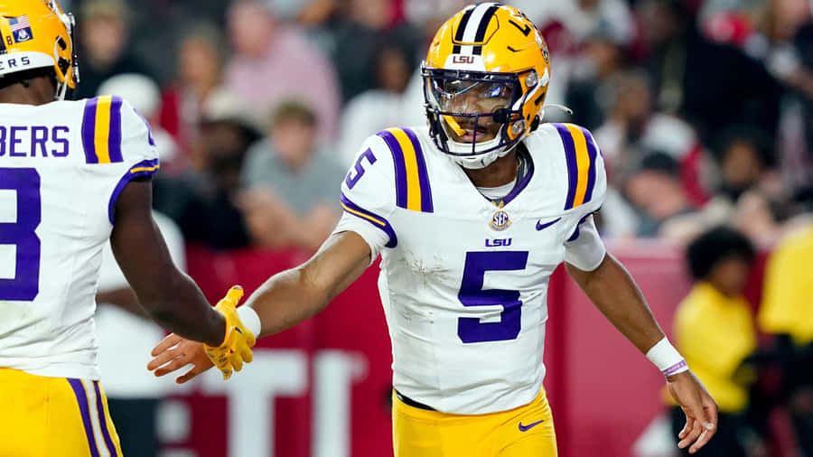 Celebrazione di Stretta di Mano del Quarterback LSU