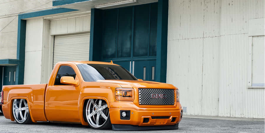 Caminhonete GMC Laranja Personalizada