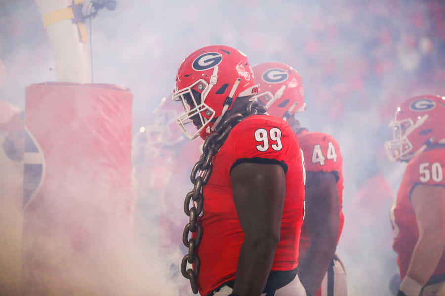 Georgia Footballspieler mit Kette am Eingang