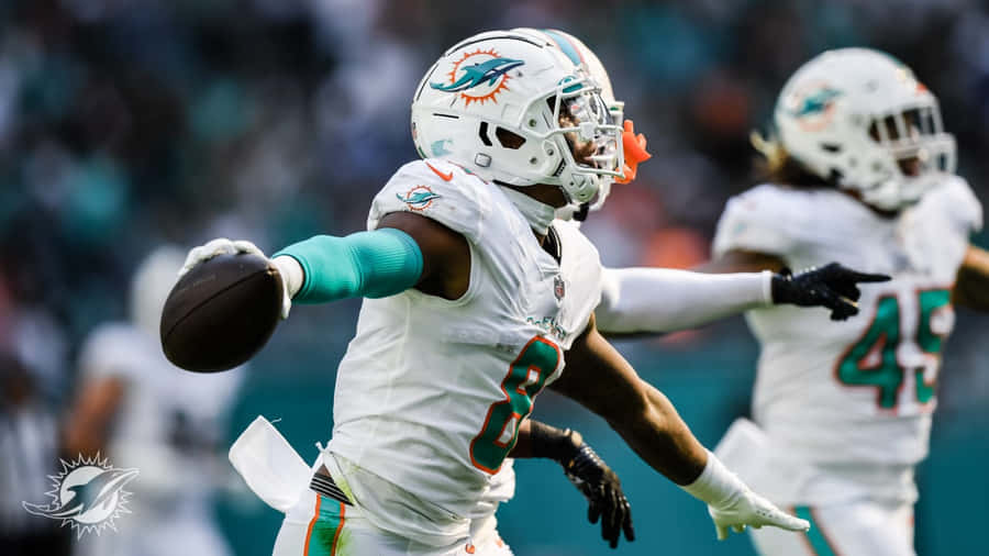 Jogador dos Miami Dolphins Celebrando em Campo