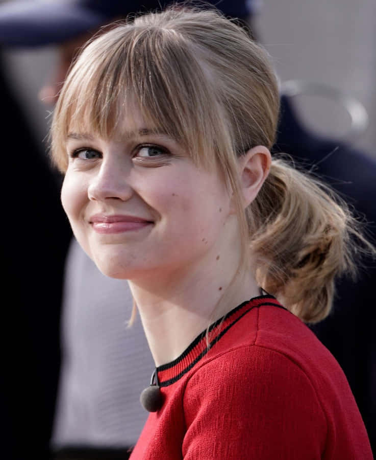 Retrato Sorridente de Angourie Rice