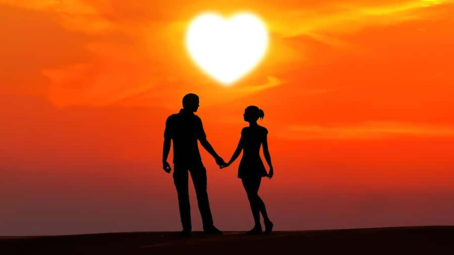 Silhouette di coppia romantica al tramonto