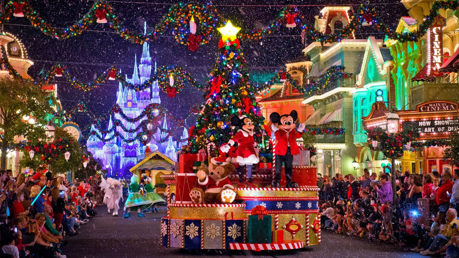 Download 2560x1440 Disney Christmas Parade Wallpaper | Wallpapers.com