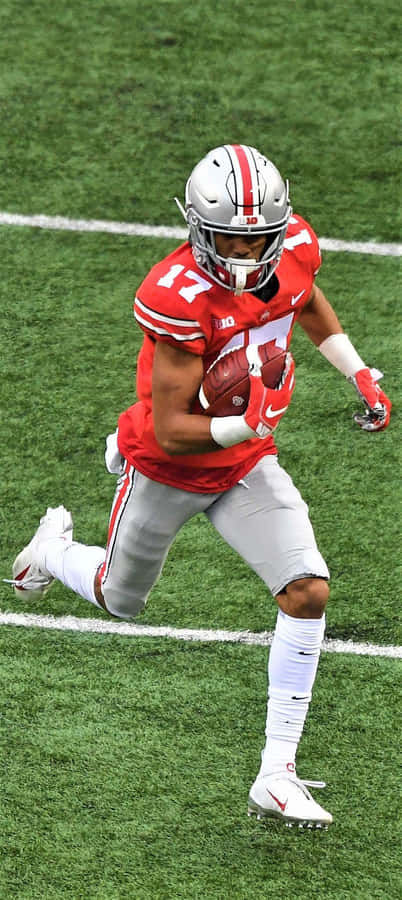 Chris Olave Scatto in Azione Ohio State