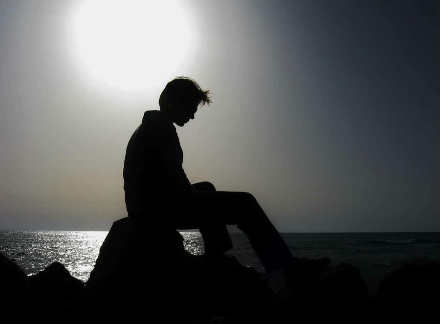 TraurigesPersonen-Mann-Silhouettenbild