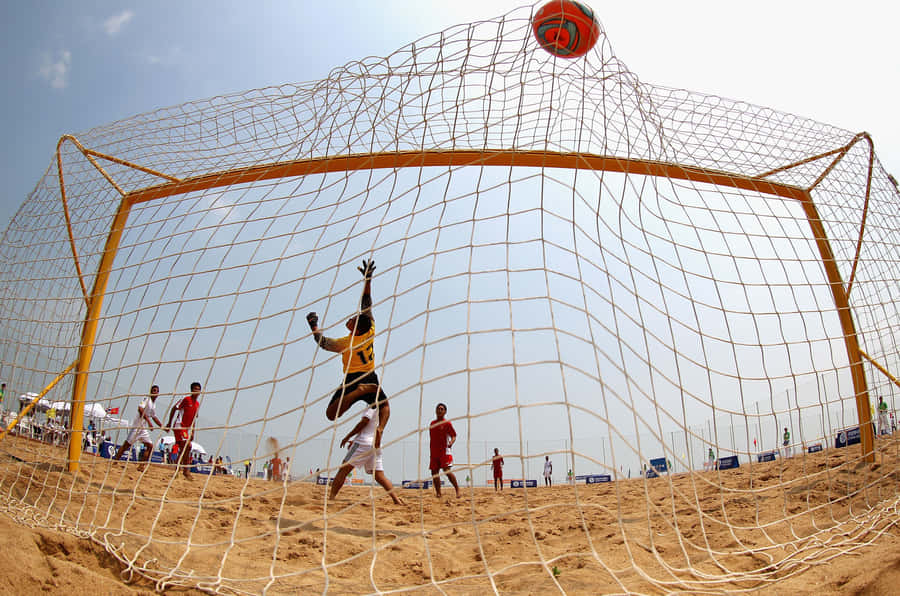 Goleiro de Futebol de Praia Pulando