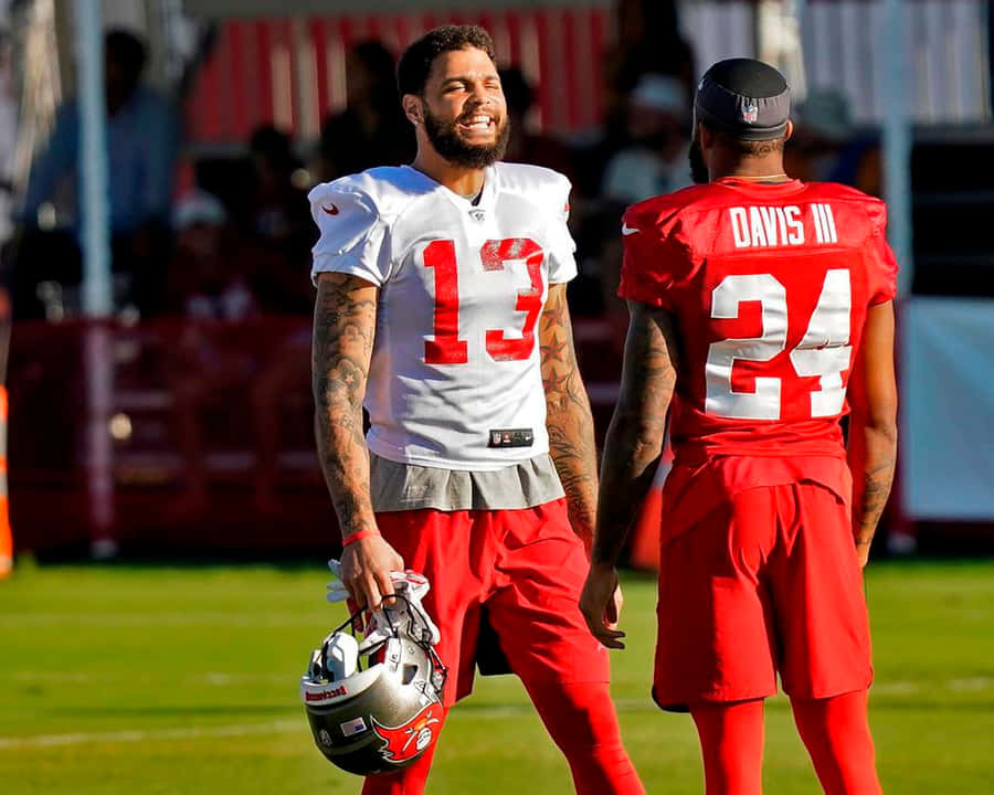 Carlton Davis With Teammate