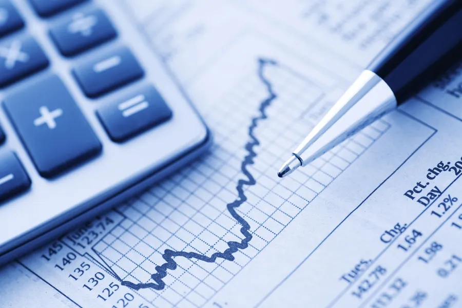 Finance graph and calculator wallpaper
