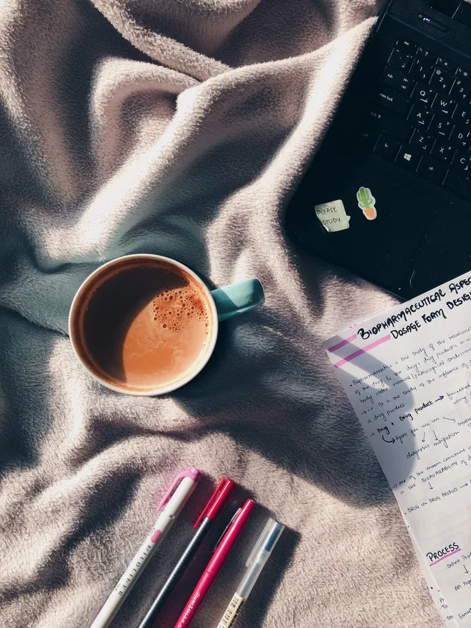 Studying On Bed Sheets