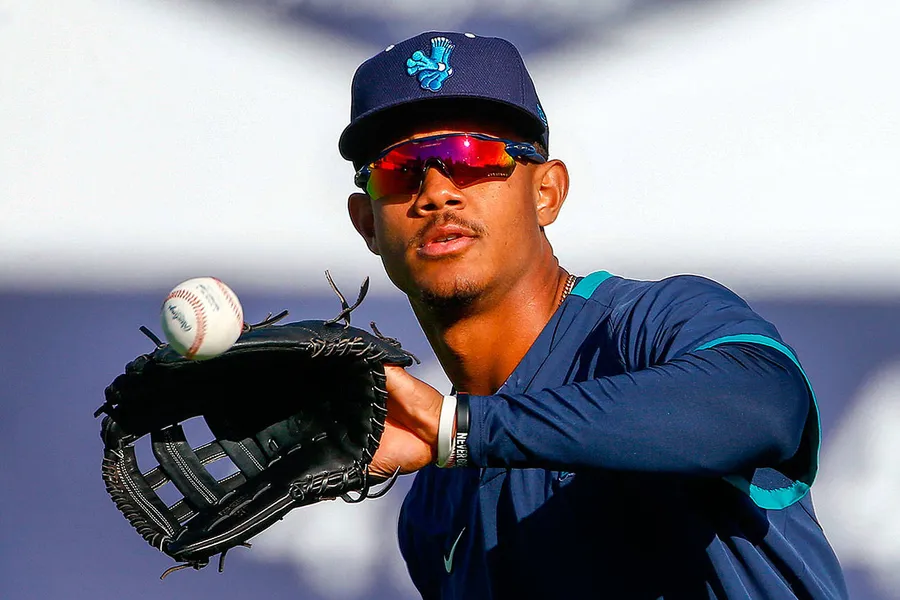 Baseball Player Catching Practice