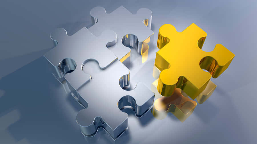 EinPuzzleteil mit einem gelben Stück oben drauf.