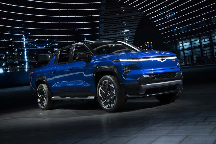 Furgone Elettrico Blu in Mostra Notturna