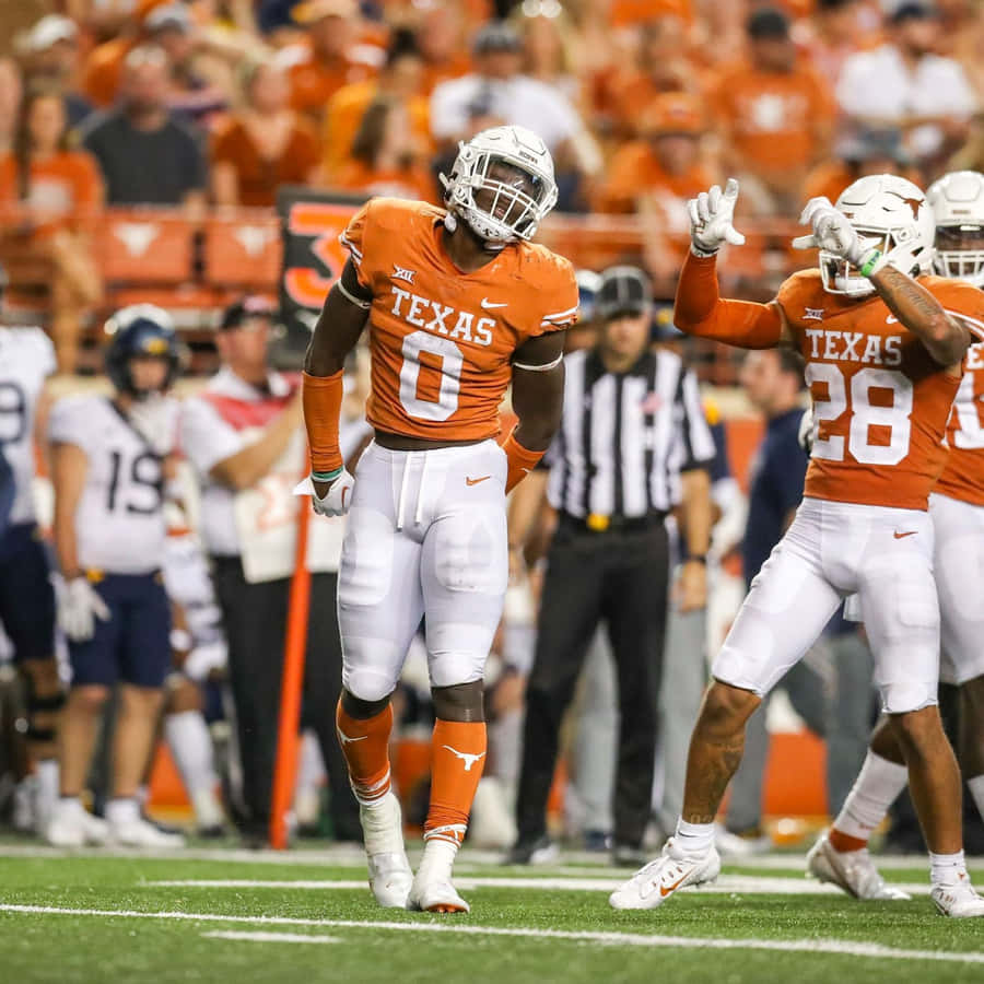 Jogador de Futebol do Texas Celebrando