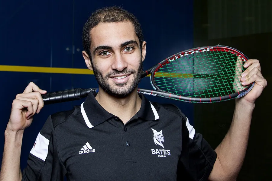 Boy Posing With Squash Racket