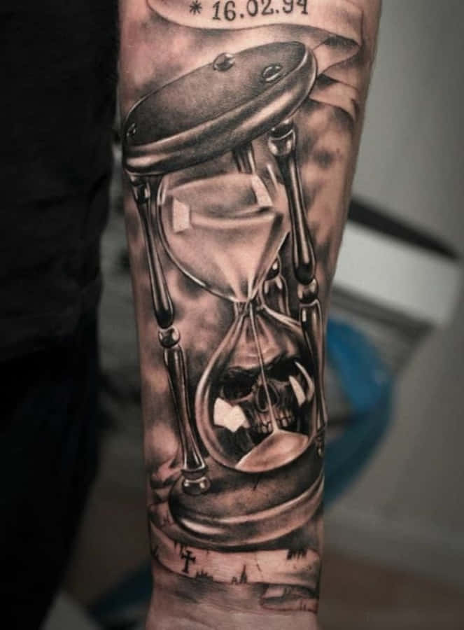 TimeglasMand Tattoo Arm Billede
