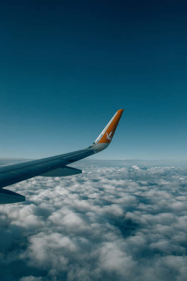 Asa de Avião Sobre Nuvens