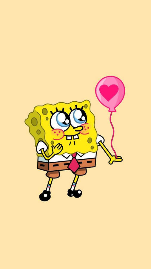 NiedlicherSpongeBob Schwammkopf, der einen rosa Ballon hält.