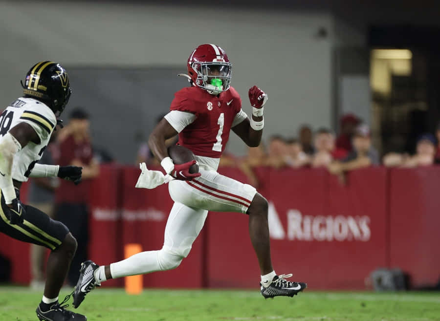 Jogador de Futebol da Alabama em Ação