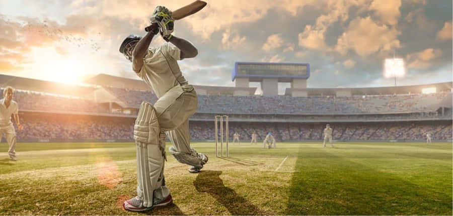 Cricketspieler Schlägt Sonnenuntergang Stadion.jpg