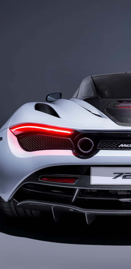 Fundode tela do McLaren 720s em pixel 3xl com vista traseira do carro esportivo.