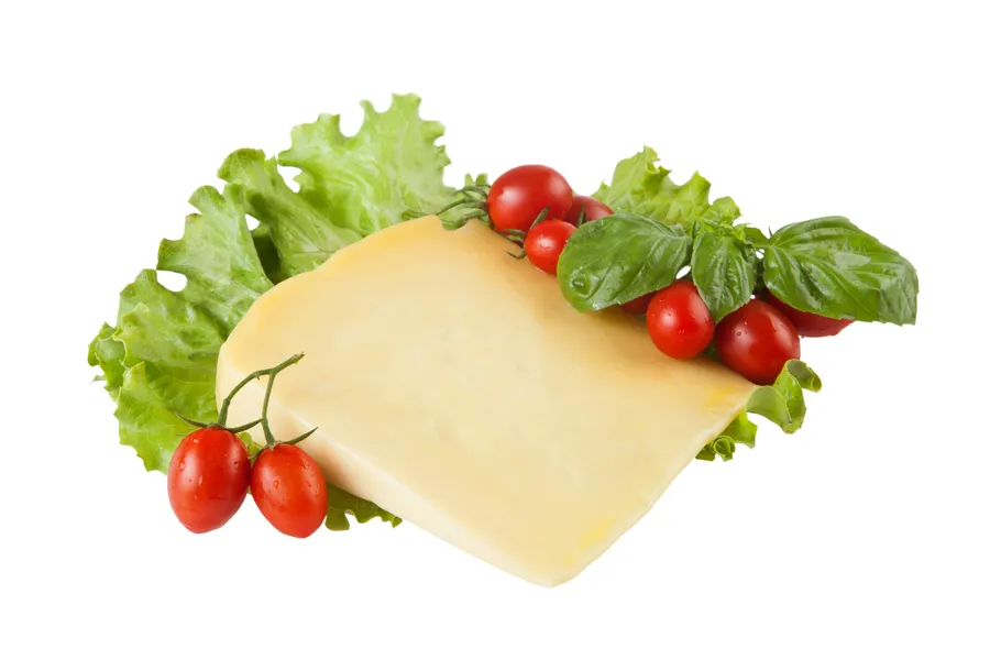 Cheese slice with tomatoes on lettuce wallpaper