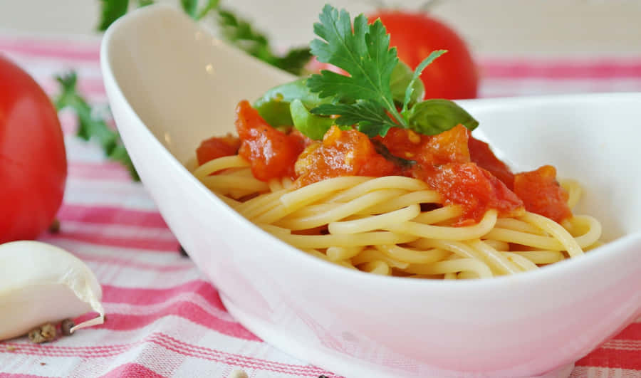 Nyden lækker tallerken pasta.