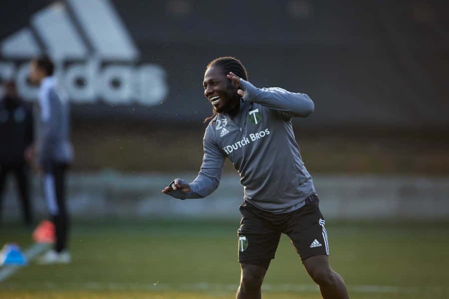 Rire d'un Joueur de Football à l'Entraînement