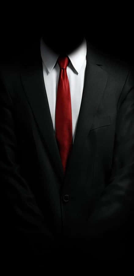 unhombre en traje y corbata roja