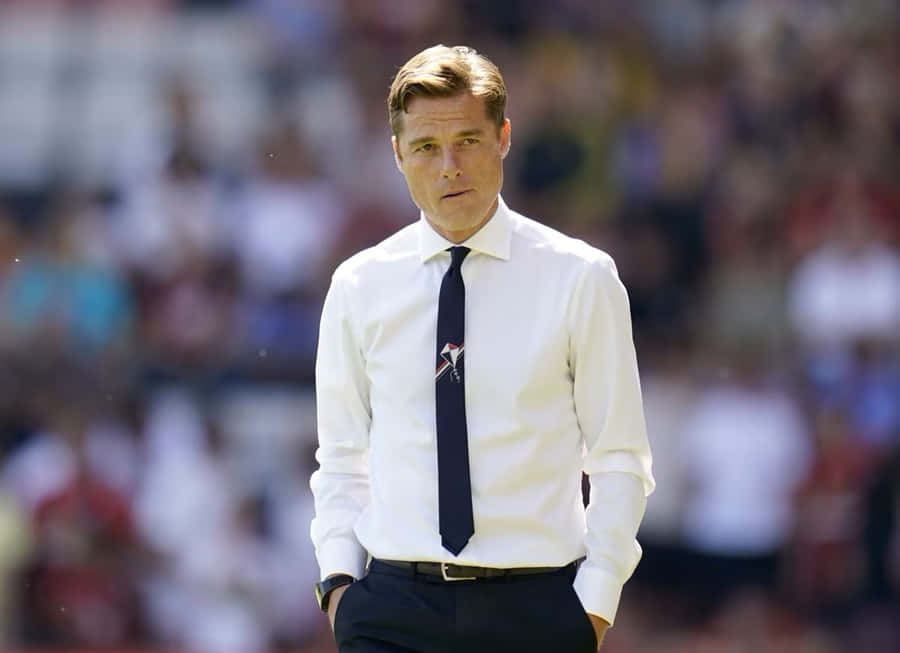 I'msorry, but "Scott Parker" doesn't provide sufficient context for me to translate the sentence into Danish. Could you please provide a more specific sentence?
