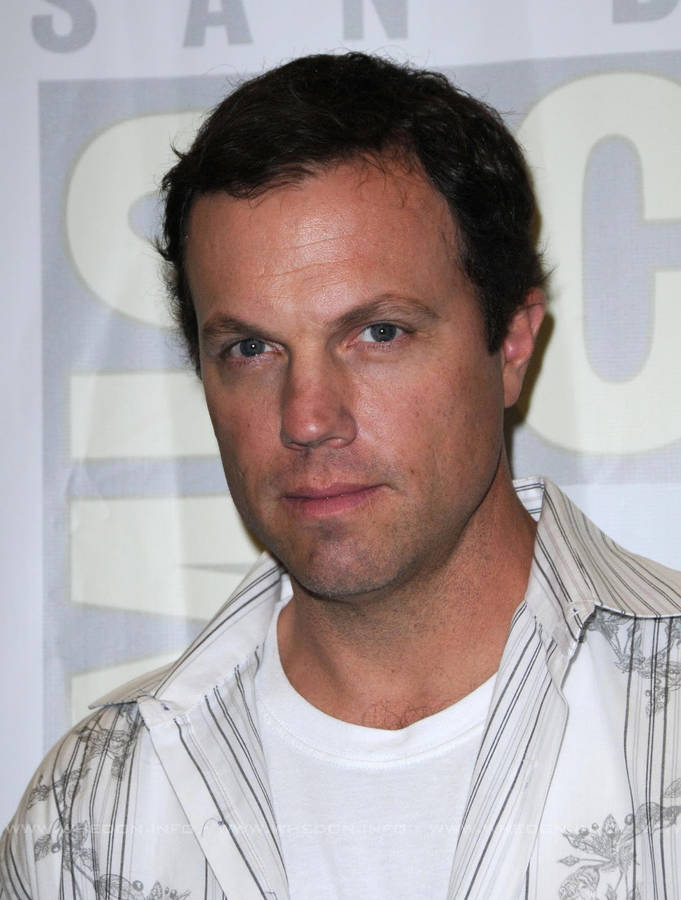 Download Adam Baldwin In White Wallpaper | Wallpapers.com