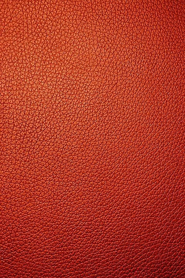 Bildmit Porträt eines roten Leder-Textureffekts.