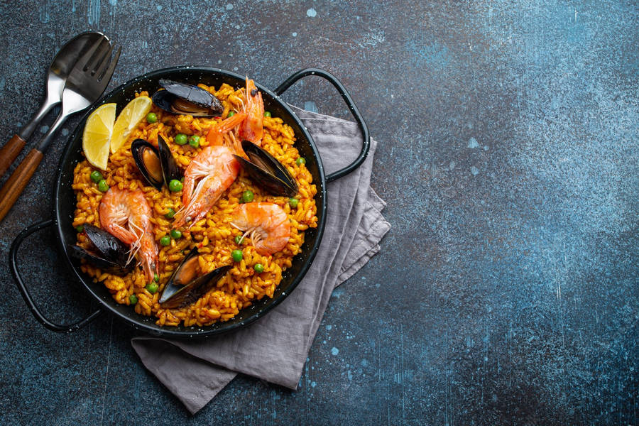 Download Aesthetic Paella Dish In Pan Wallpaper | Wallpapers.com