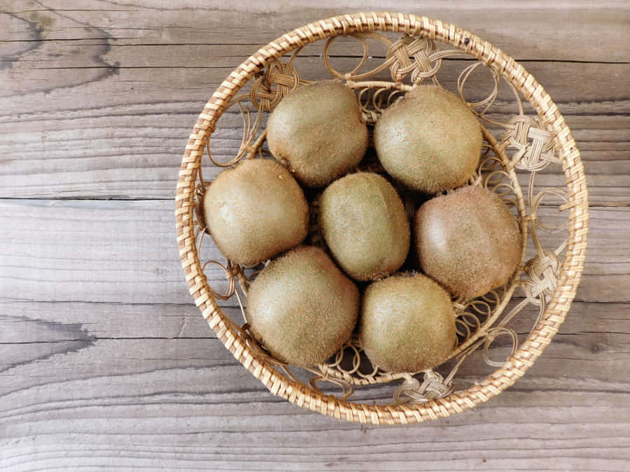 juicy,healthy,food,eating,organic,diet,ripe,kiwi,cutting,fruits,dessert,nutrition,red,kiwifruits,cross section,ingredient,half,isolated,table,wooden