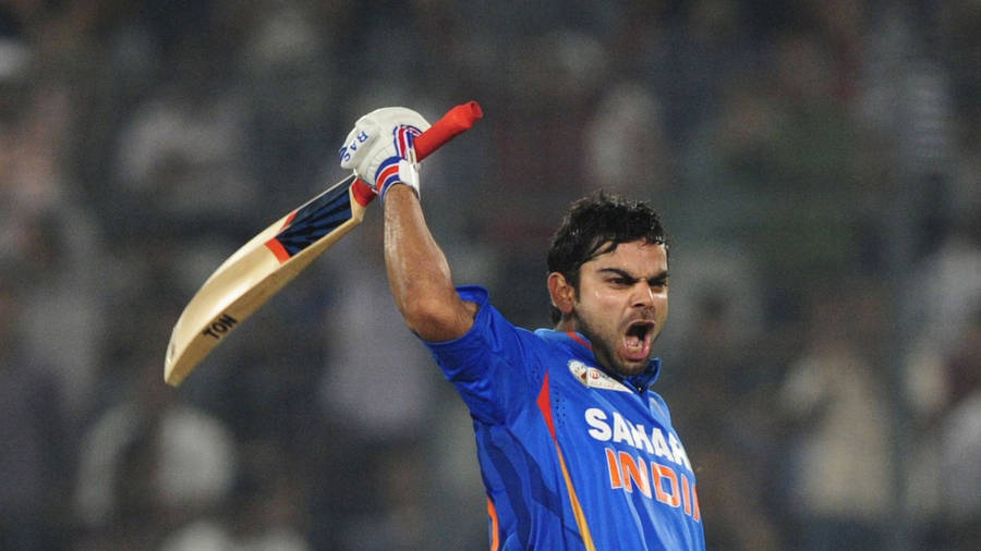 Download Angry Virat Kohli Wallpaper | Wallpapers.com