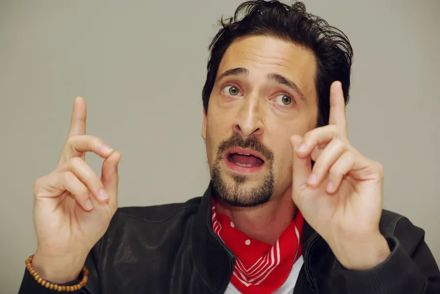 Adrien Brody Pointing Up wallpaper