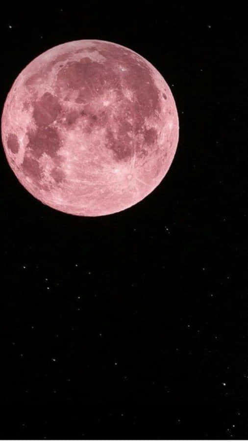 StupendaLuna Fragola che illumina il cielo notturno.