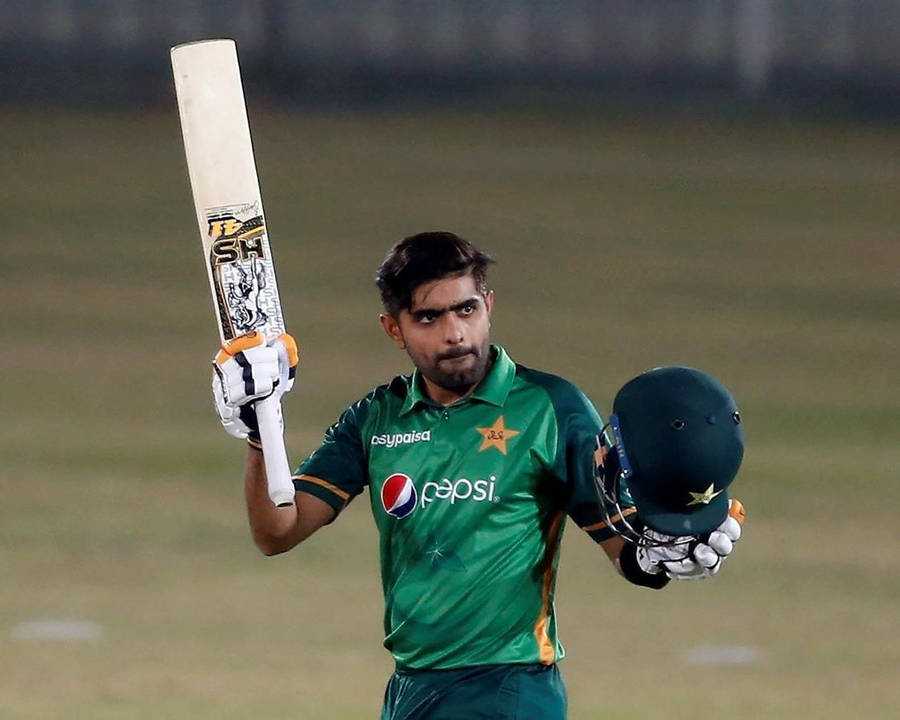 Download Babar Azam With Bat And Helmet Wallpaper | Wallpapers.com